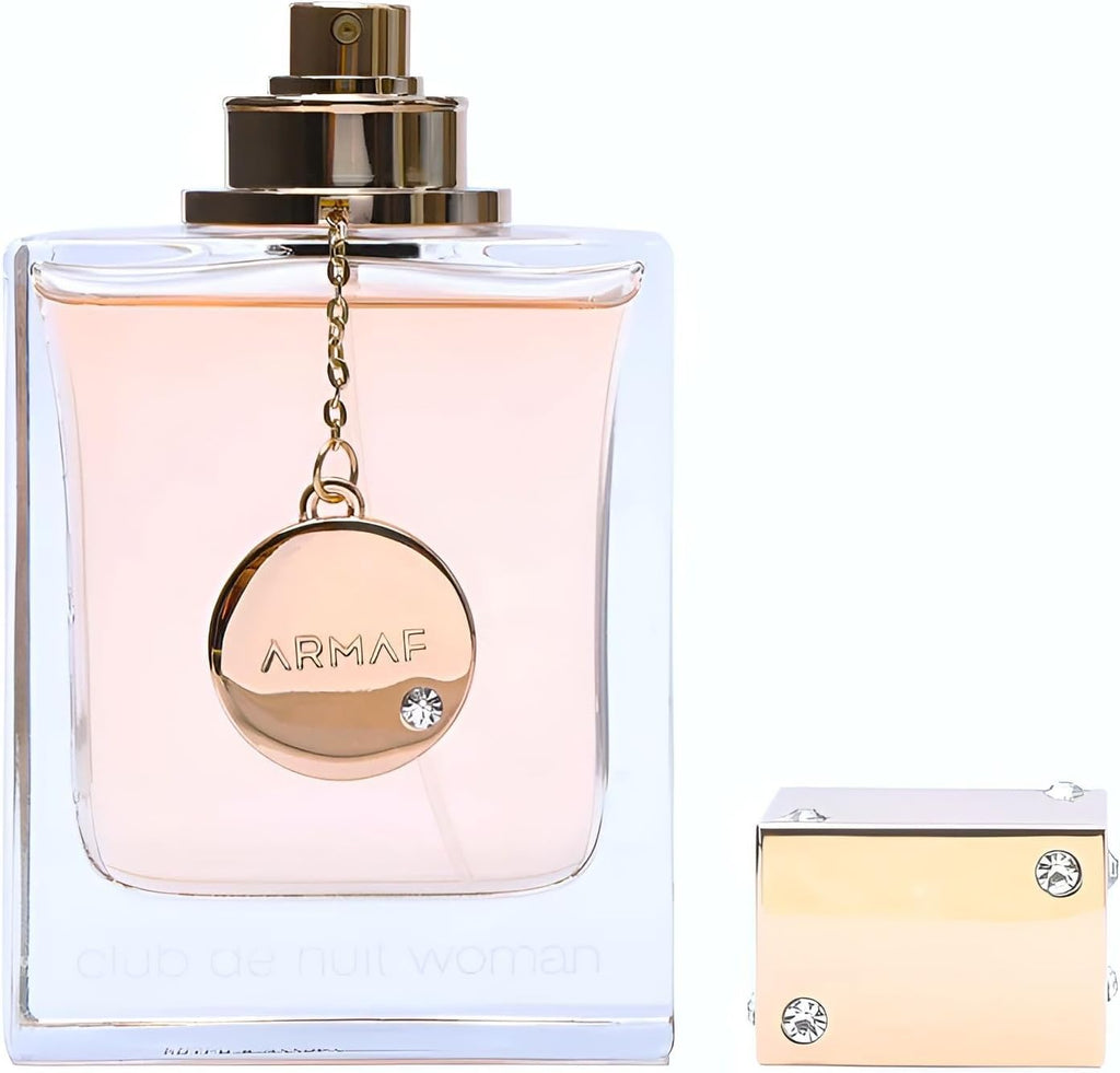 Armaf perfume bottle with gold cap and chain on a white background
