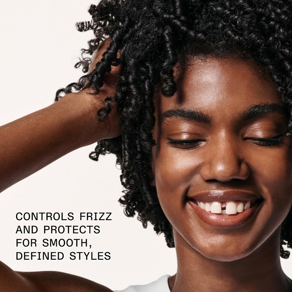 Woman with styled hair against a white background with text about hair product benefits.
